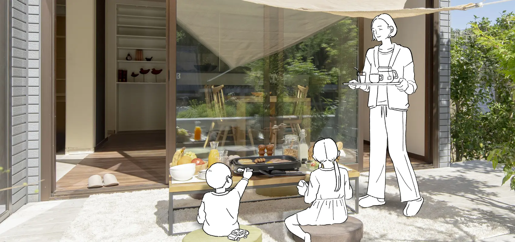 テラスでモーニングを楽しんでいる親子の様子