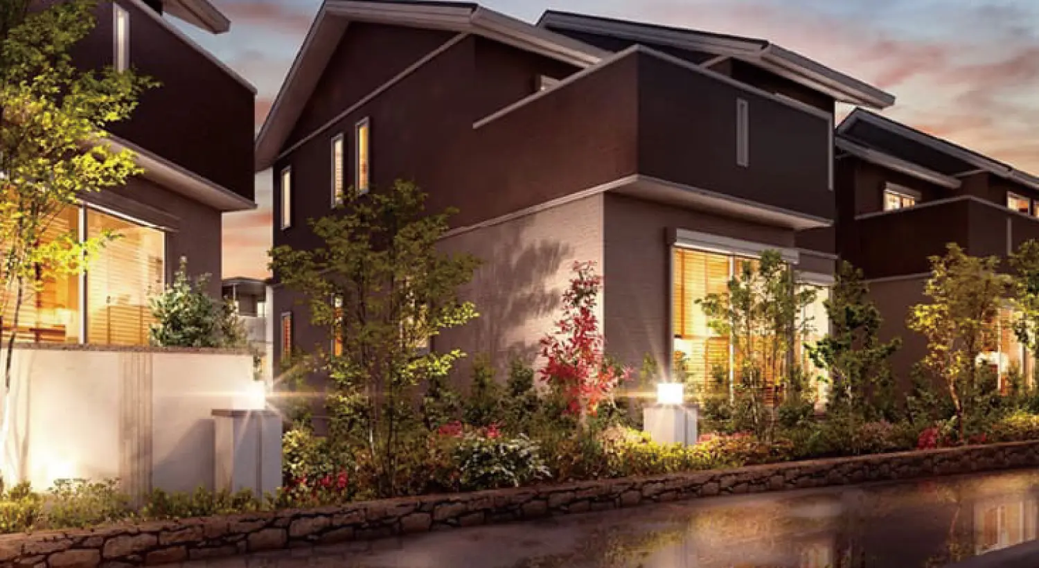 ライトアップされた夜の分譲地のまちなみ